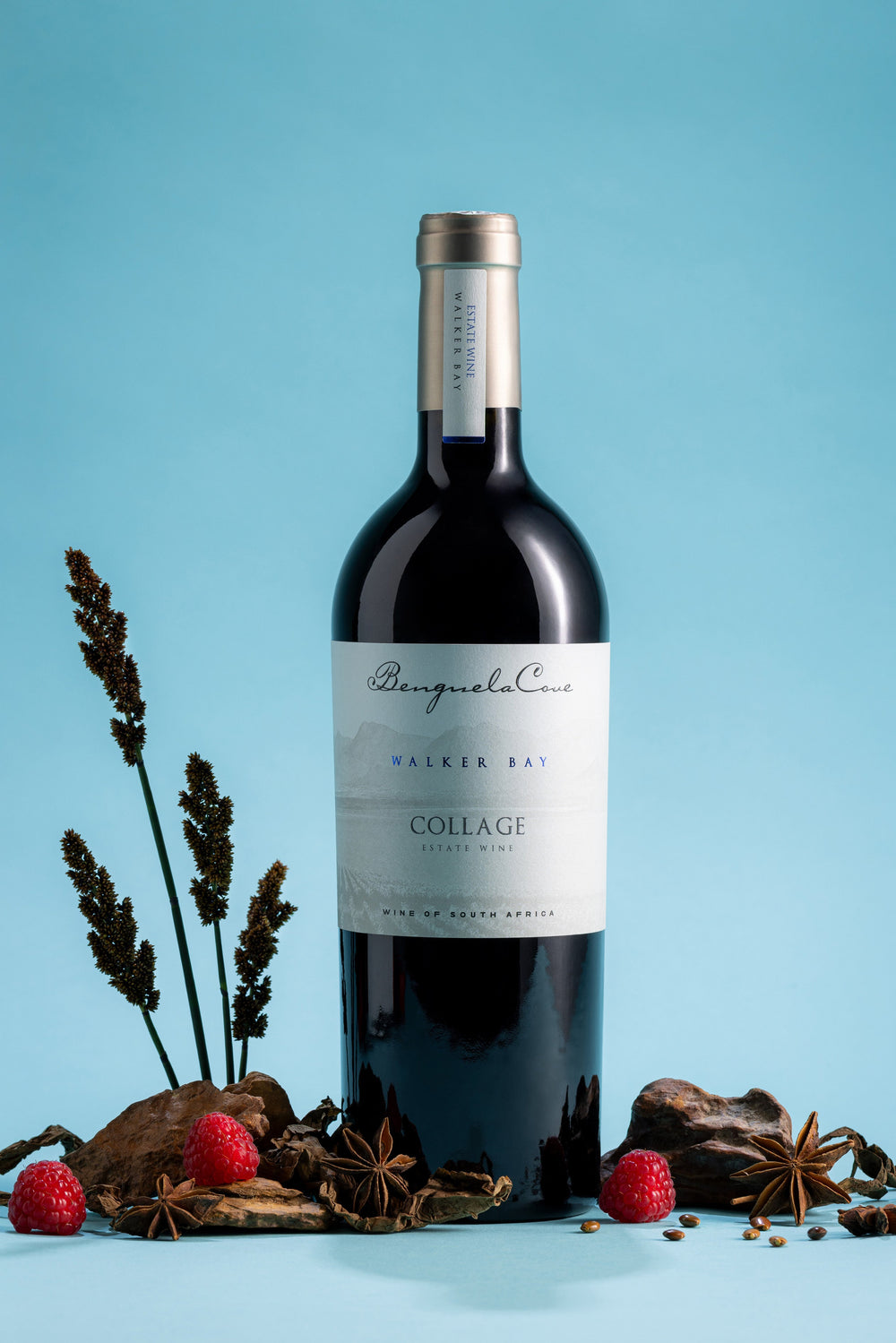 Wine bottle with decorative elements on a blue background