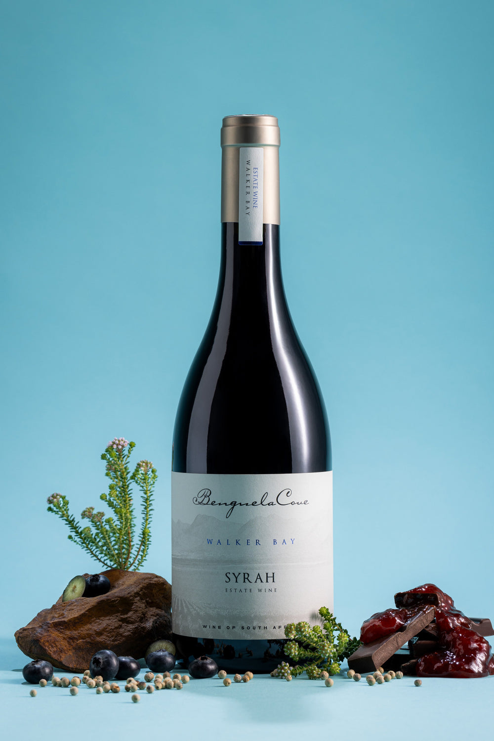 Bottle of wine with a label on a blue background