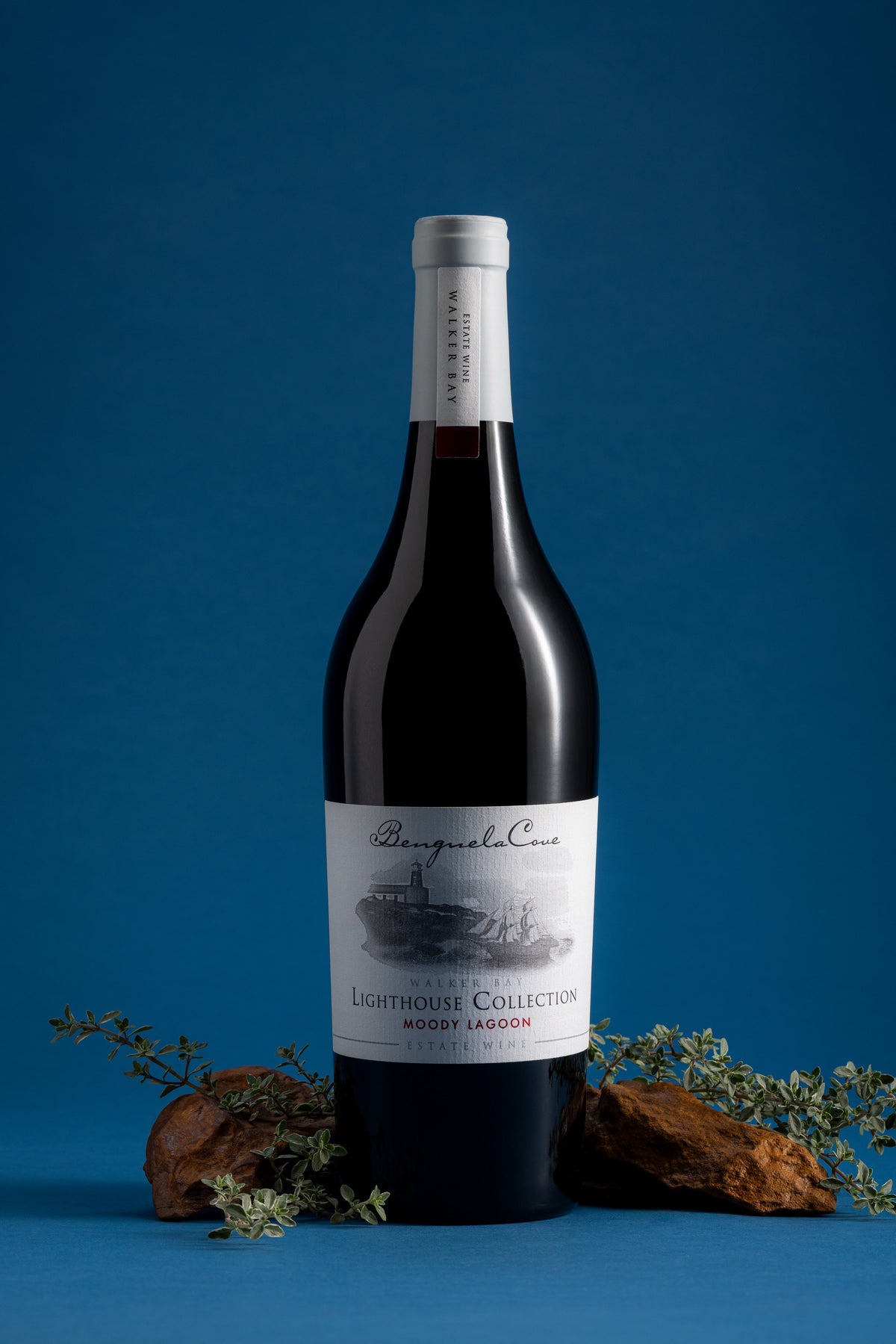 Wine bottle with label on a blue background