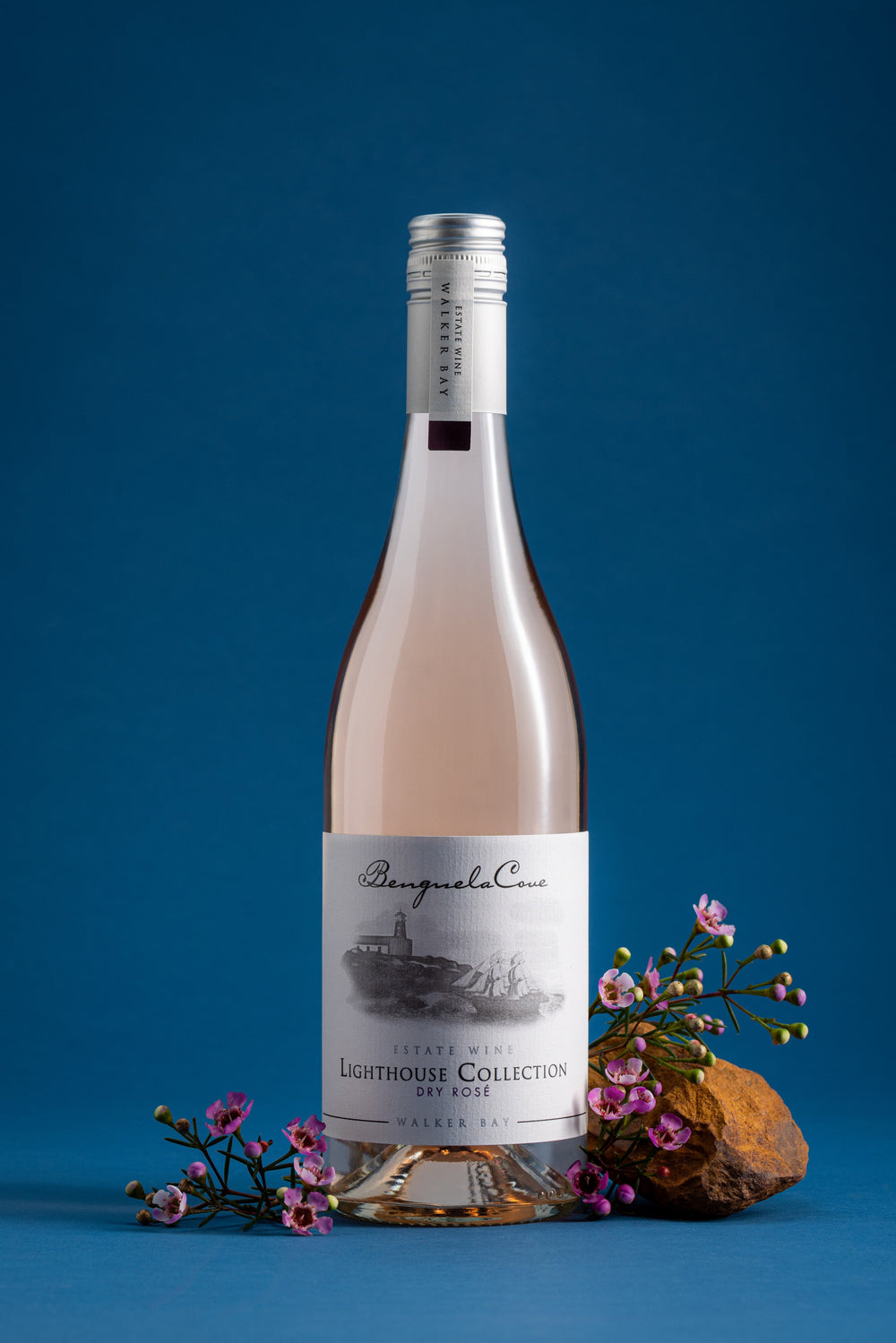 Bottle of wine with a label on a blue background