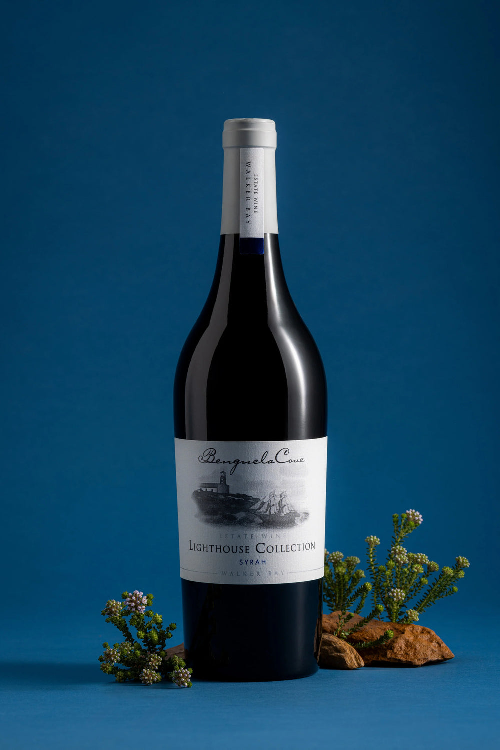 Bottle of wine with a label on a blue background